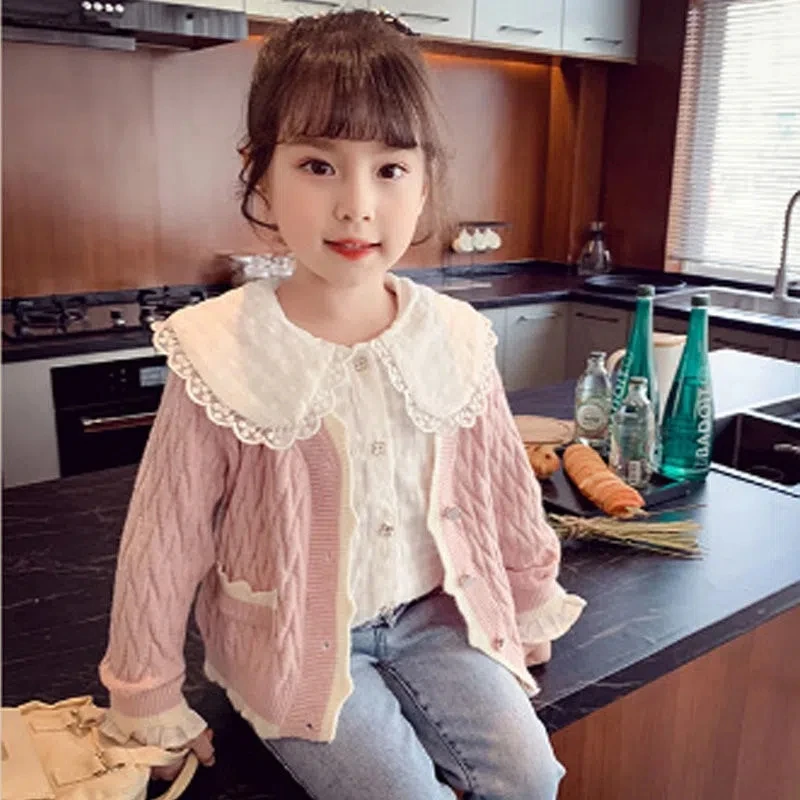 Cárdigan de punto rosa cuello redondo para niños