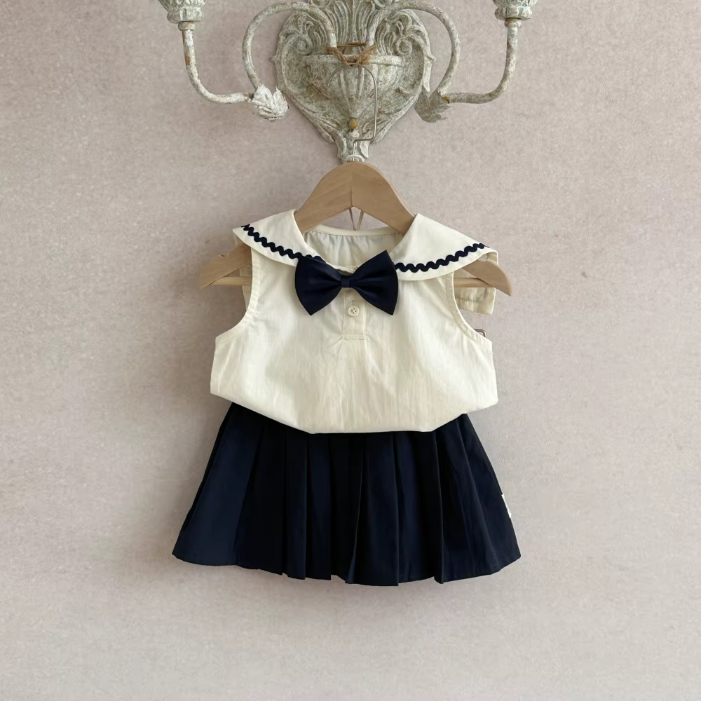 Conjunto bebé sin mangas con falda y lazo para verano - imagen 3