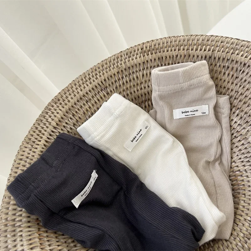 Leggings de bebé niña en algodón suave con tiras estilo primavera