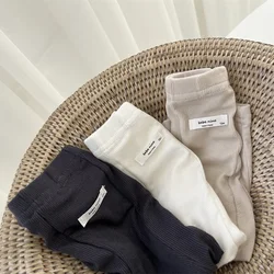 Leggings de bebé niña en algodón suave con tiras estilo primavera