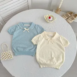 Camiseta niña calada con lazo y tejido ventilado para verano