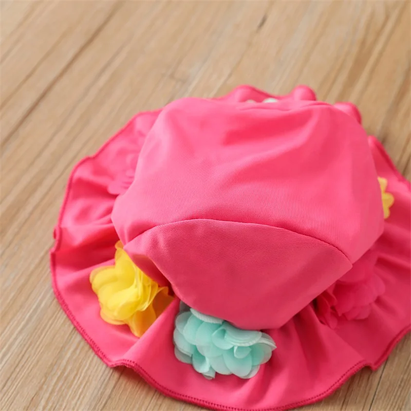 Traje de baño niña con flores, bikini halter y gorro de playa - imagen 2