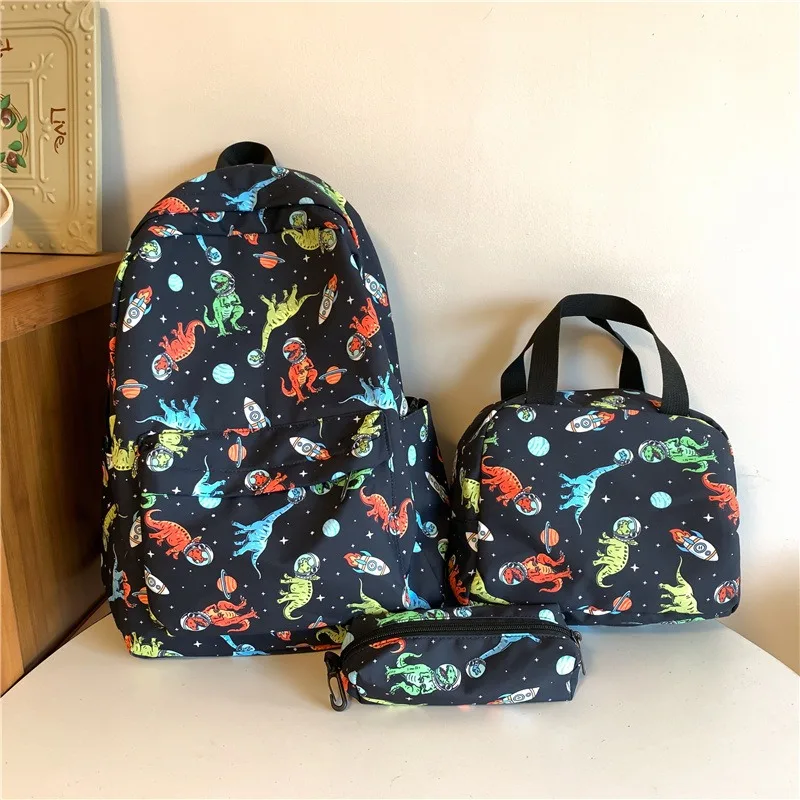 Mochila y estuche con diseño de dinosaurio verde