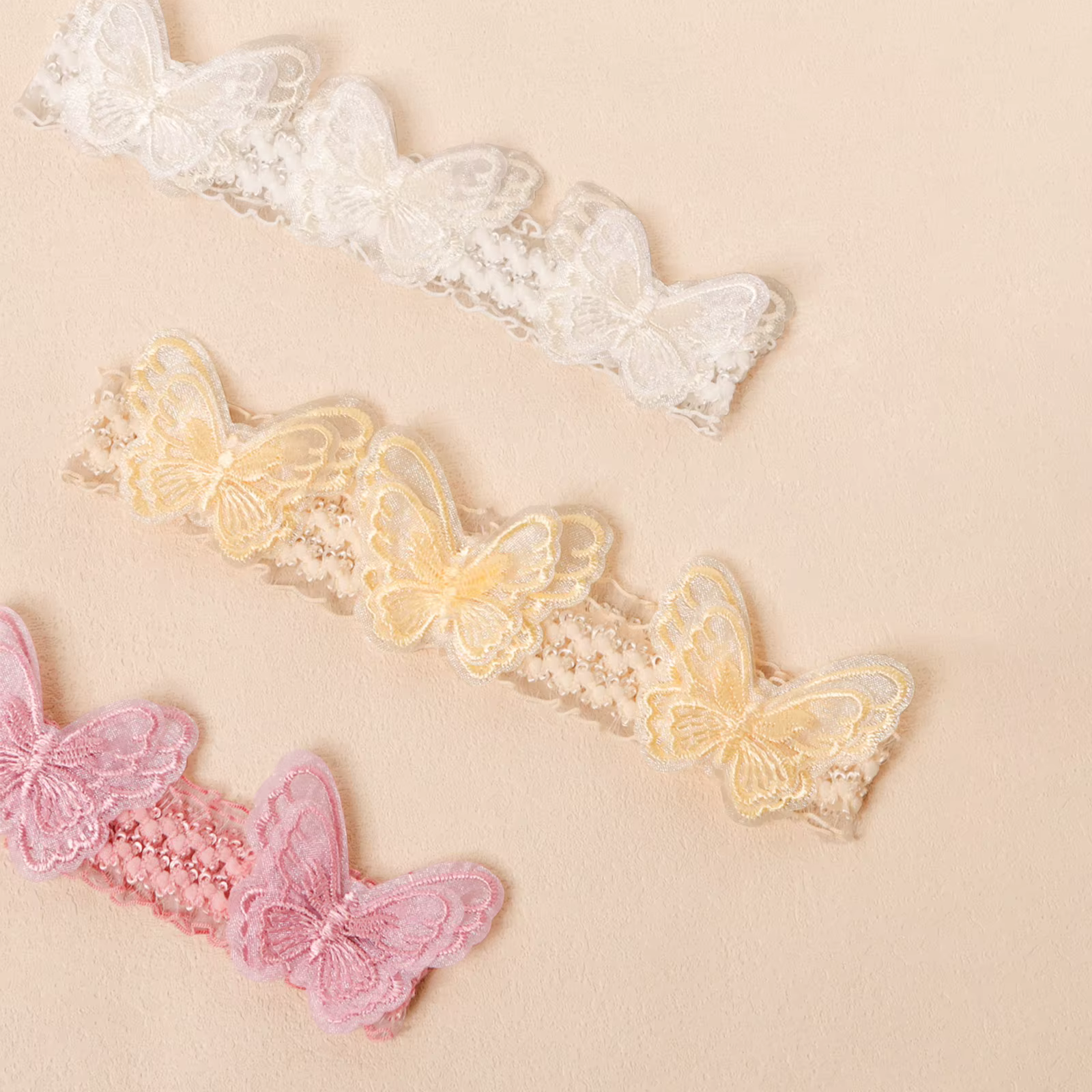 Diadema encaje suave para bebé con bordado mariposa - imagen 3