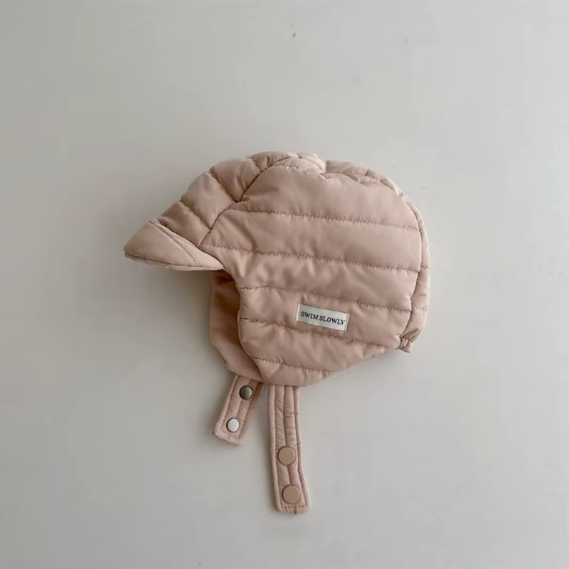 Detalle del cierre ajustable del gorro