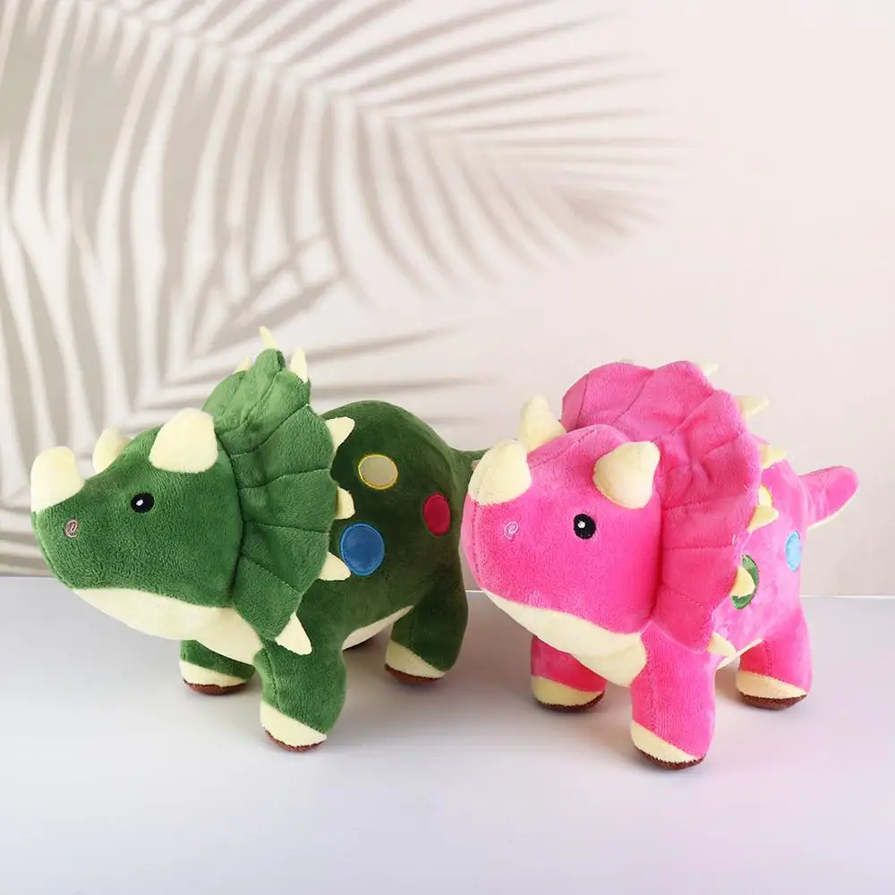 Peluche de dinosaurio visto frontal