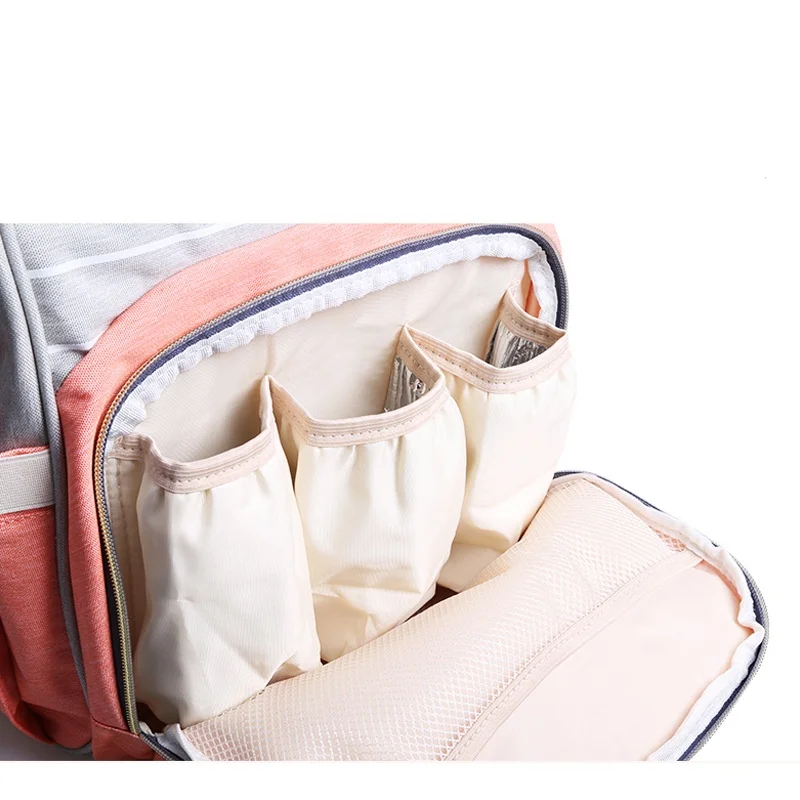 Bolsa de pañales Lequeen en diseño práctico