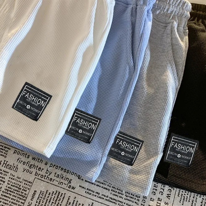 Pantalones cortos de pijama holgados con bolsillos en casa