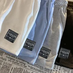 Pantalones cortos de pijama holgados con bolsillos en casa