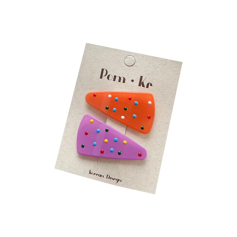 Pinzas triangulares de gelatina pastel con lunares para niños - imagen 4