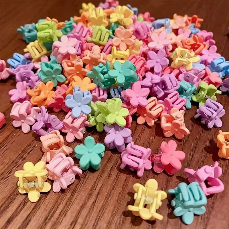 Pinzas para el pelo infantiles con flores y estrellas - imagen 5