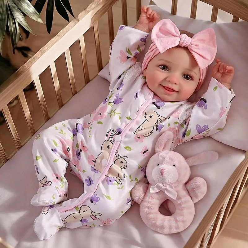 Muñeca reborn NPK con cara sonriente y cuerpo de tela suave - imagen 2