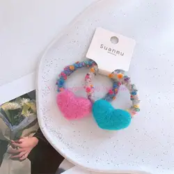 Pinzas para el pelo con lazo de fieltro corazón para bebé