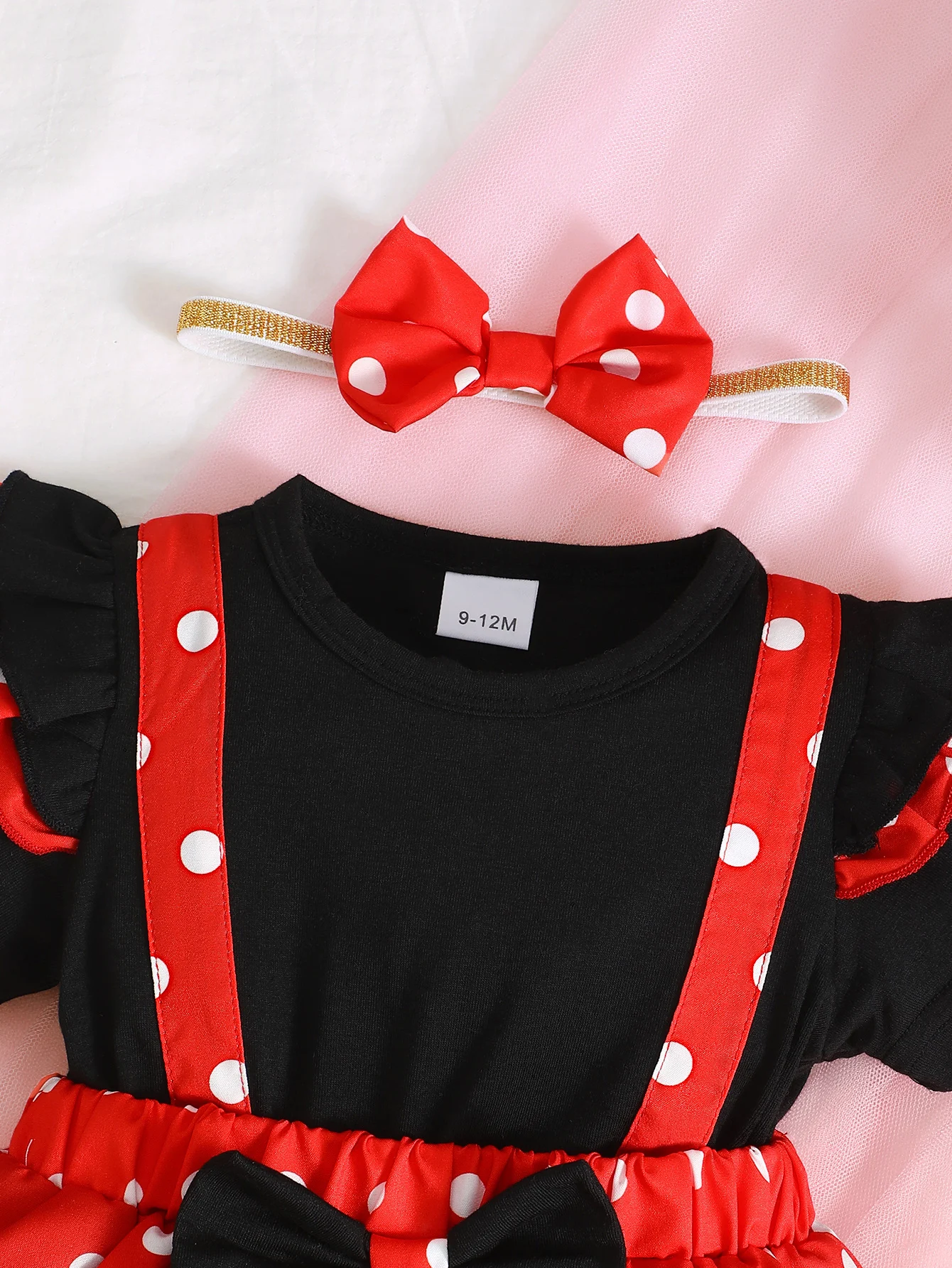 Vestido mameluco de lunares para niña recién nacida