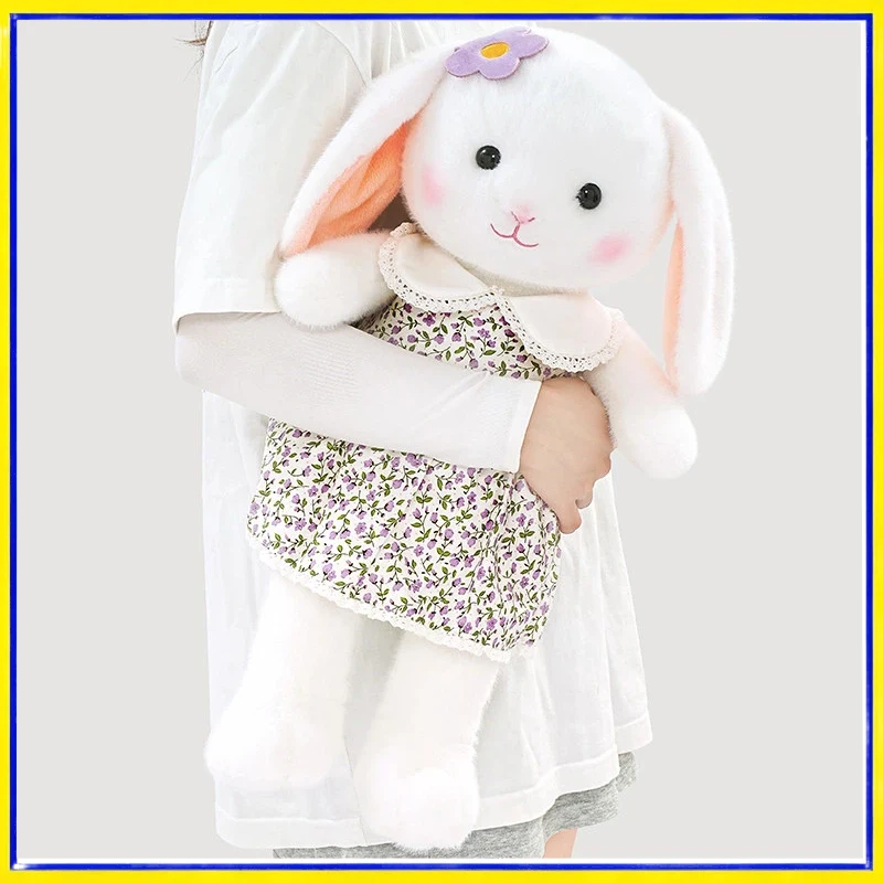 Peluche de conejo blanco orejas largas con vestido floral y flor