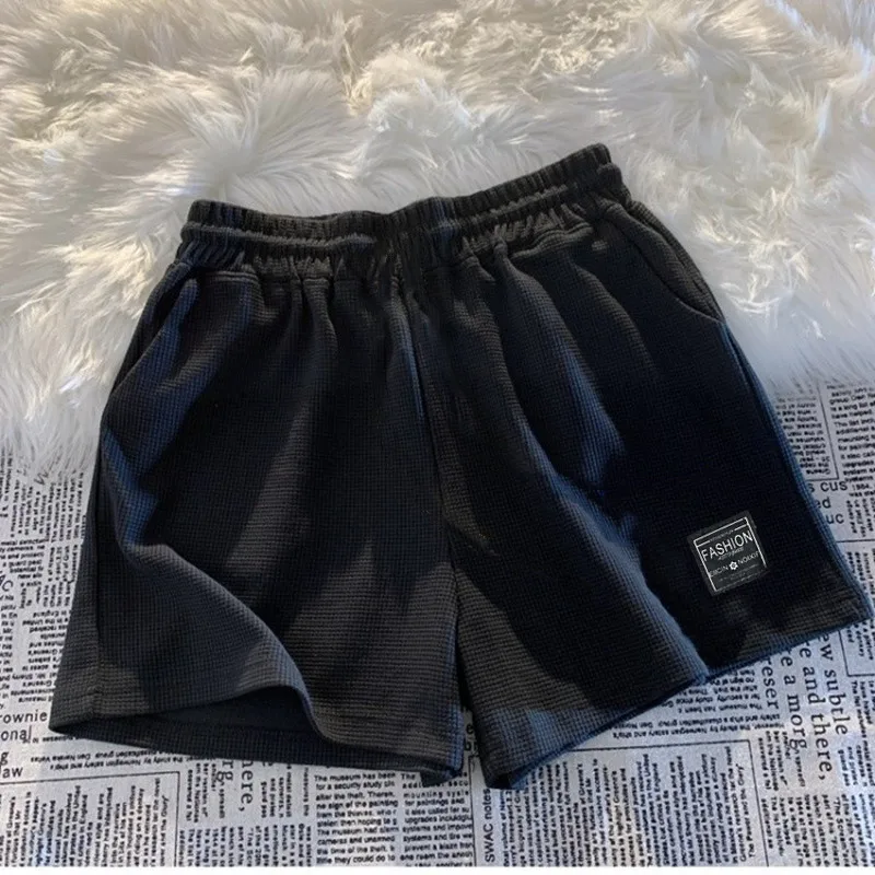 Pantalones cortos de pijama holgados con bolsillos en casa - imagen 5