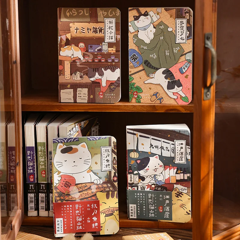 Cuaderno infantil con diseño de gato y libreta ilustrada