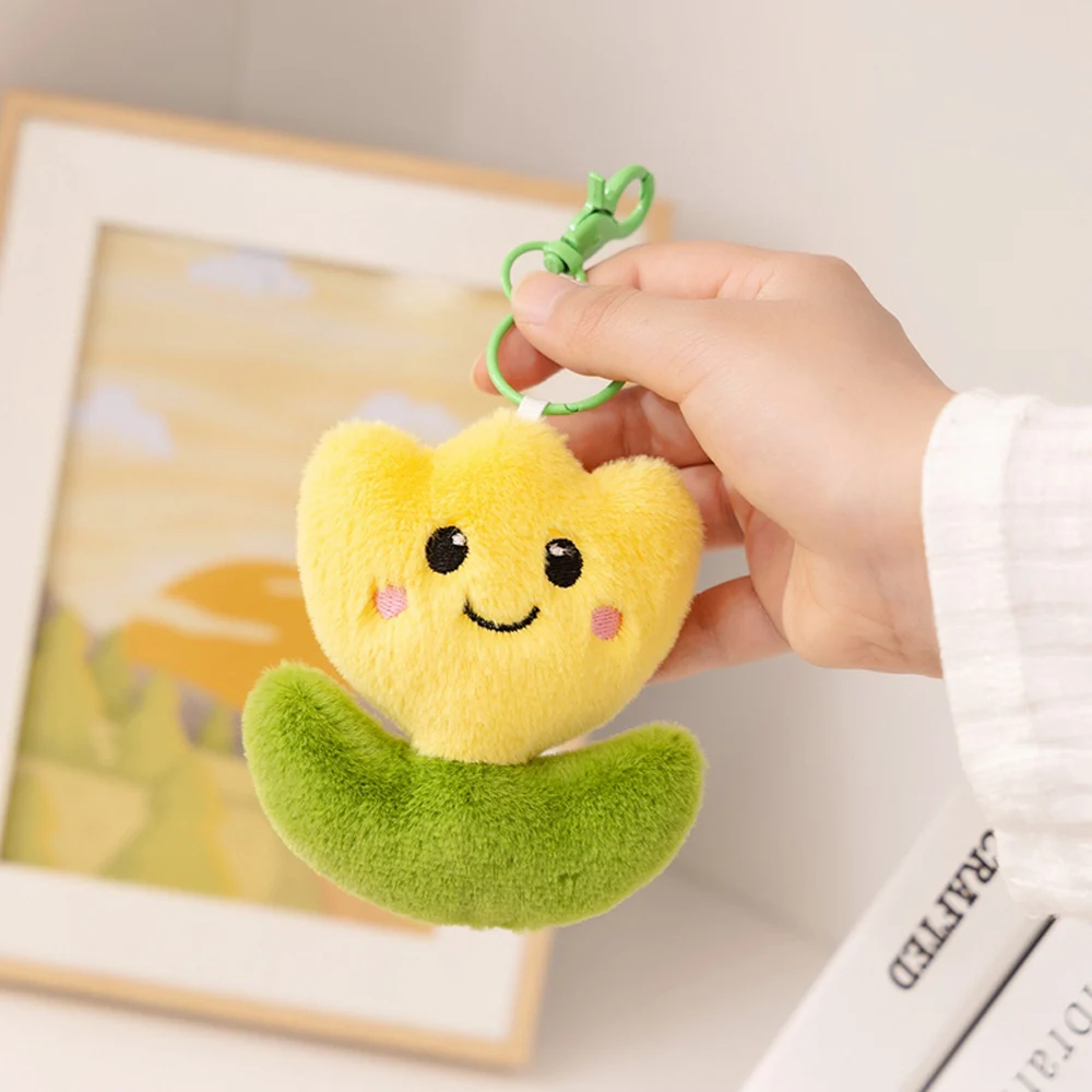 Juguete de peluche regadera verde con flores realistas - imagen 2