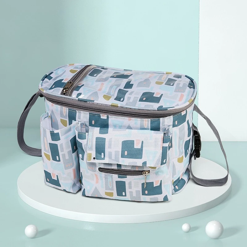 Bolsa portabebés multifuncional con bolsillo isotérmico para biberones