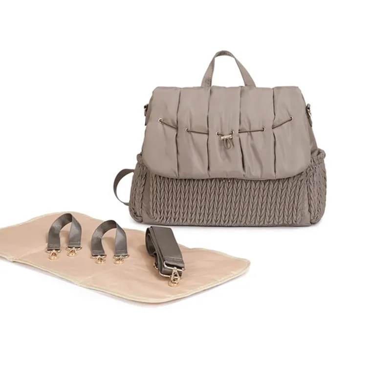 Bolsa impermeable para pañales en uso
