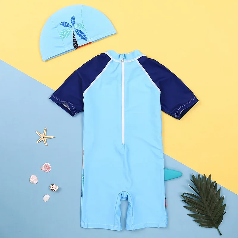 Traje de baño infantil dinosaurios con gorro y antisarpullidos - imagen 4
