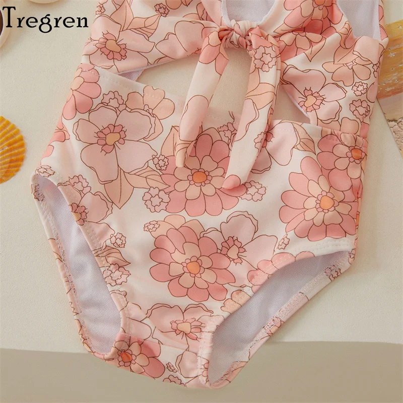 Bañador de niña sin mangas con estampado floral y concha