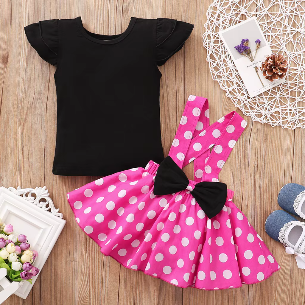 Conjunto de camiseta negra y falda con lunares para niña