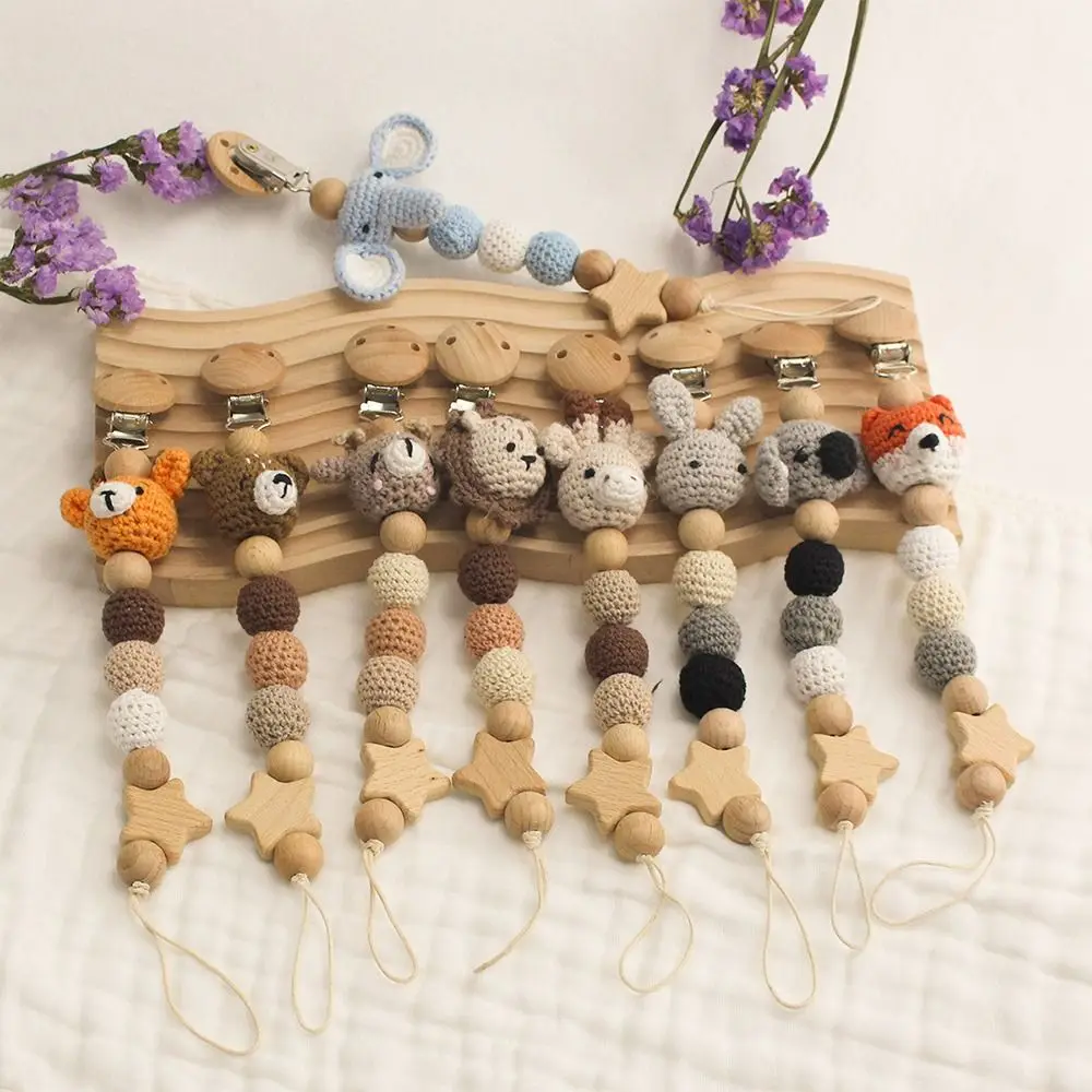Soporte para chupete de madera de haya con bolsa anticaída - imagen 4