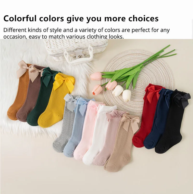 Tres pares de calcetines infantiles con lazo