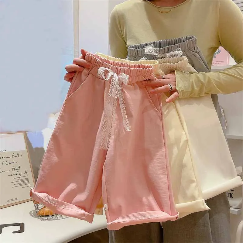 Pantalones finos para niña con encaje y pierna ancha