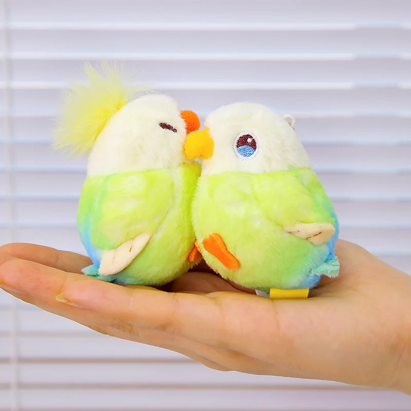 Pareja de pájaros de peluche colgante