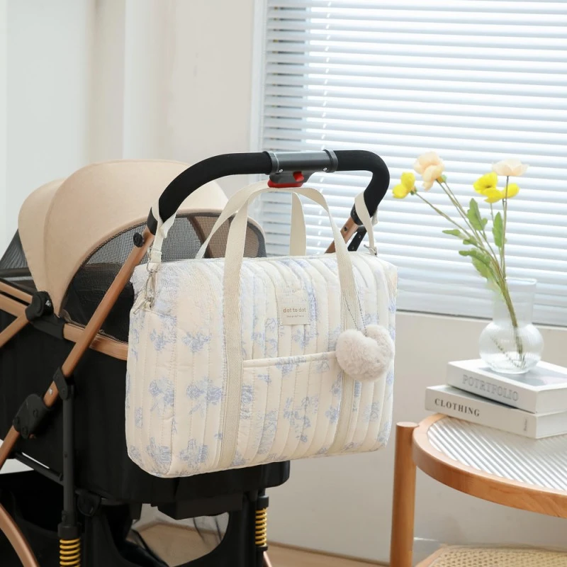 Bolsa de pañales multifuncional floral para mamá con bandolera