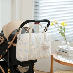 Bolsa de pañales multifuncional floral para mamá con bandolera