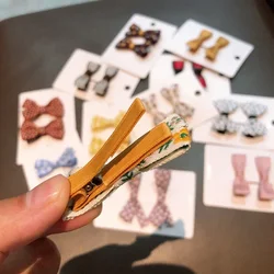 Pinzas para el pelo con lazo de tela color liso – bebé y niños