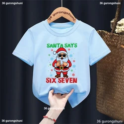 Camiseta de Navidad divertida con copos y Papá Noel para niños