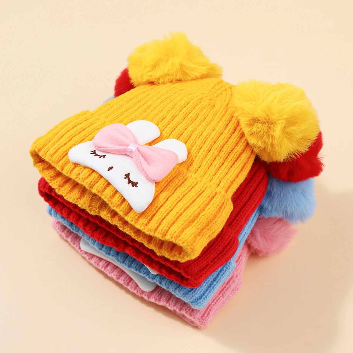 Gorro de punto con pomponas para niños – Calentito con conejito - imagen 4