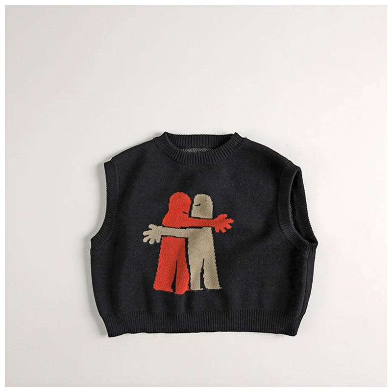 Detalle del tejido jacquard del chaleco infantil
