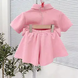 Conjunto bebé niña con camiseta de solapa y pantalón casual
