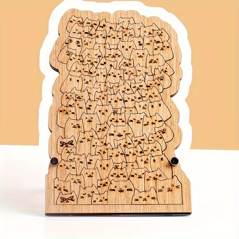 Detalle del puzzle con cien gatos ilustrados