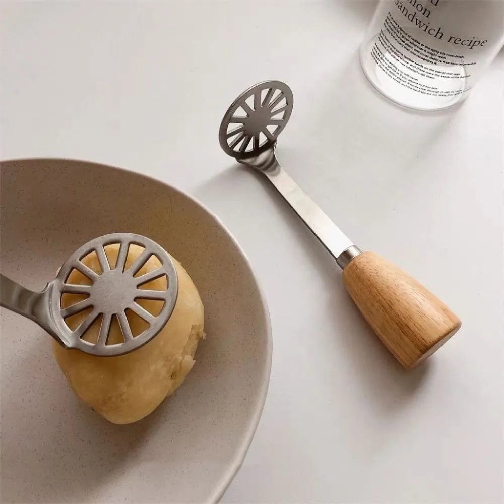Trituradora manual de acero inoxidable para frutas y verduras - imagen 3