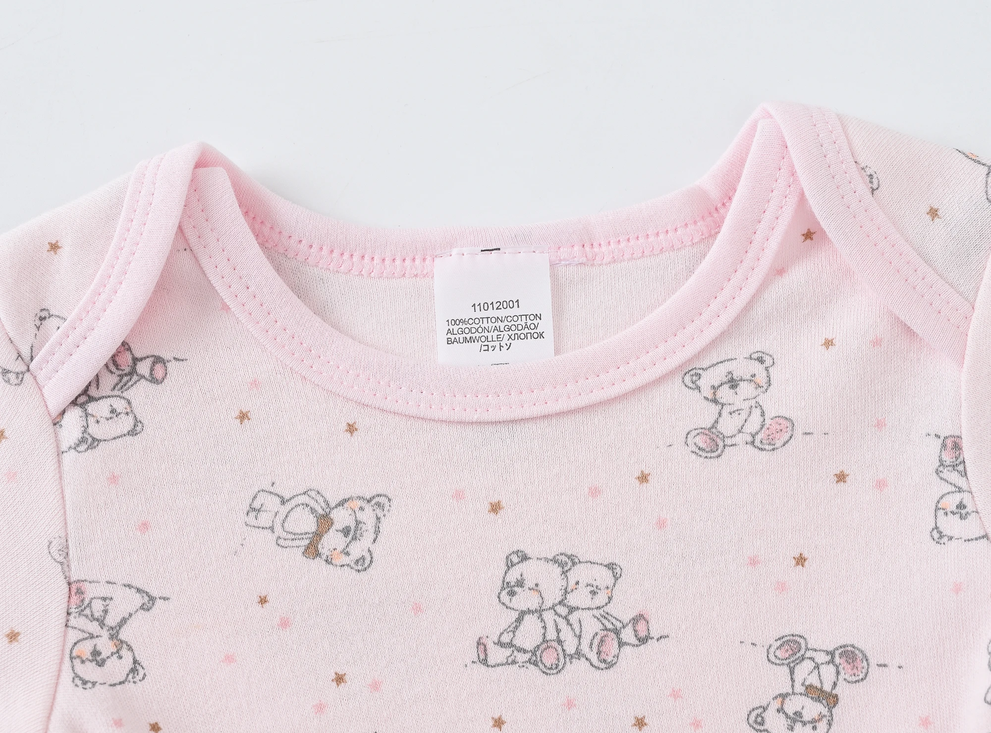 Conjunto de bebé con oso rosa