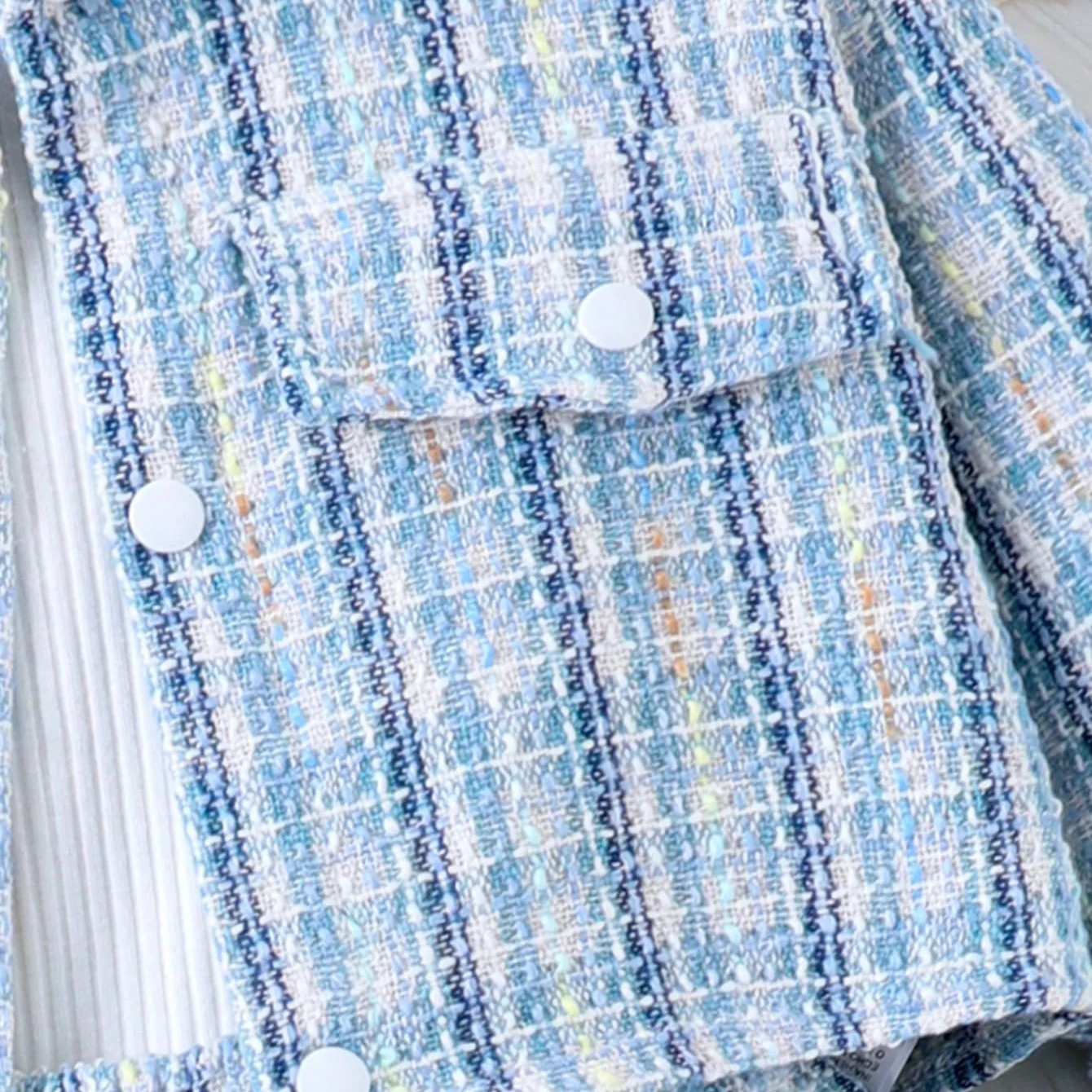 Conjunto de bebé con chaqueta a cuadros, top y falda