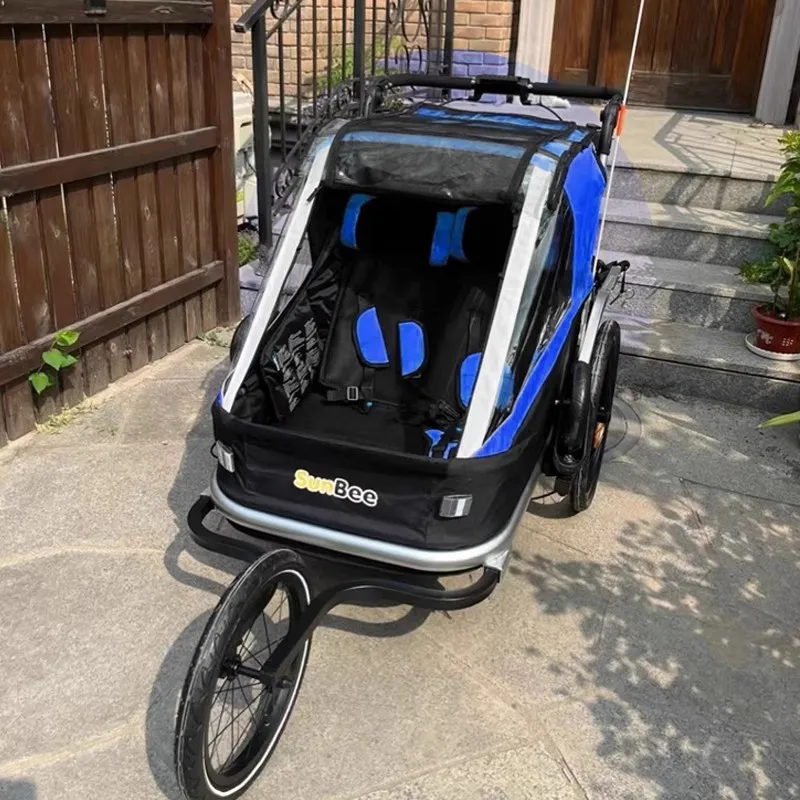 Remolque en modo bici con los niños dentro
