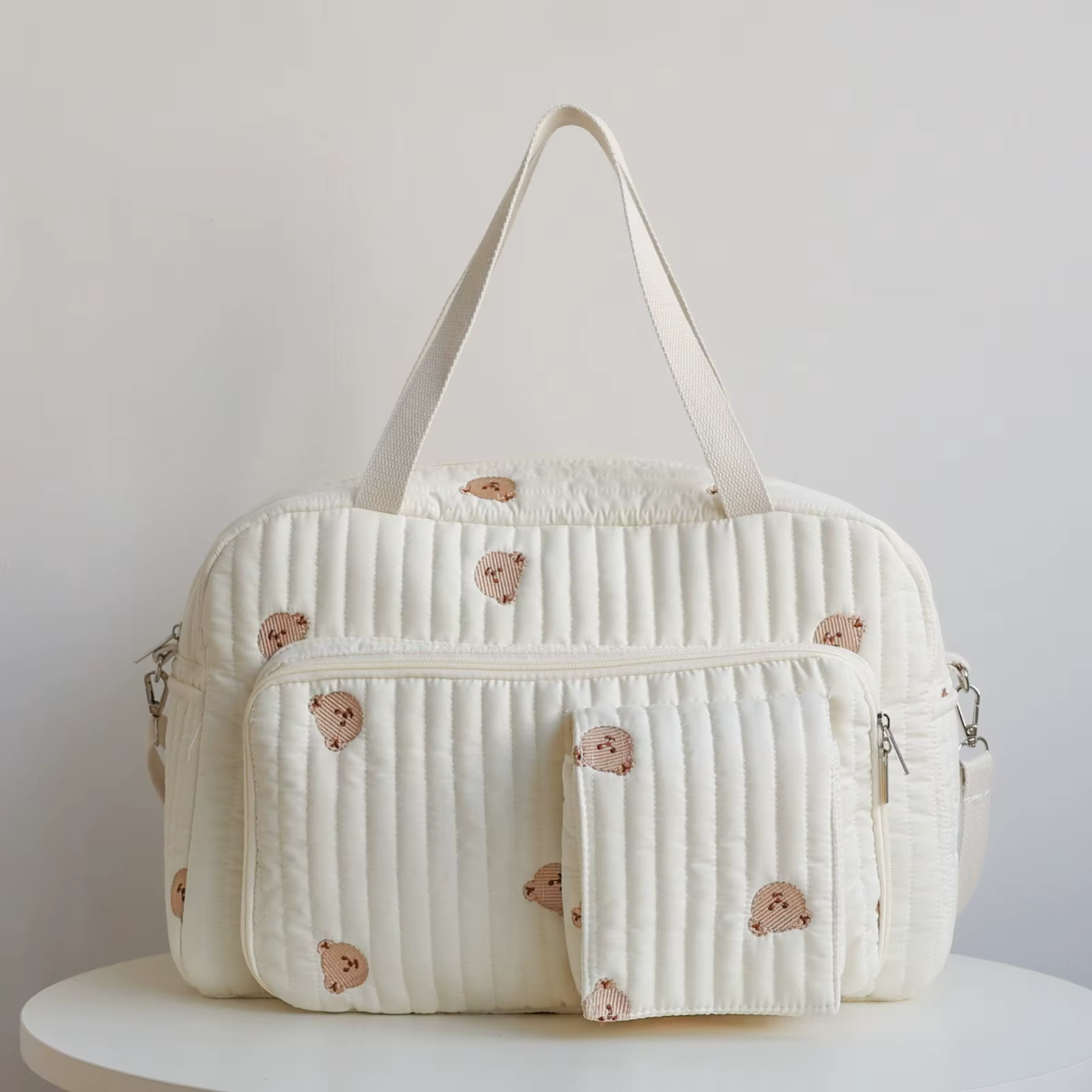 Pañalera bandolera floral de gran capacidad elegante
