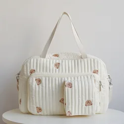 Pañalera bandolera floral de gran capacidad elegante