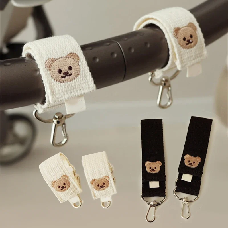 Gancho para cochecito de bebé con diseño de oso