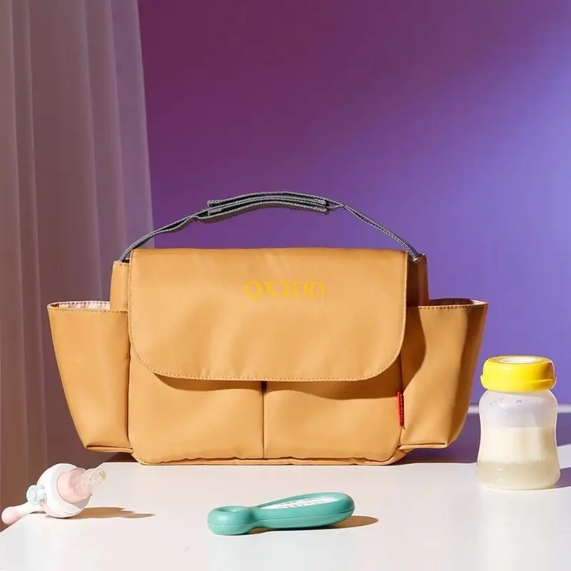QX2D Bolsa de pañales impermeable de nylon para carrito