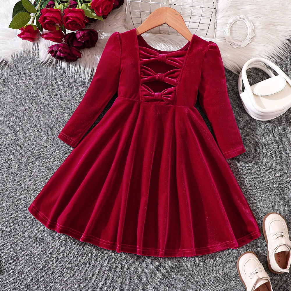 Detalle del lazo y el acabado del vestido