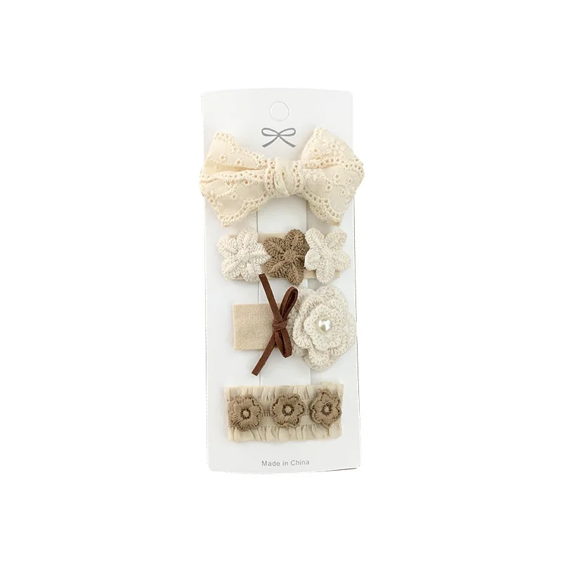 Pinzas pelo niña con lazo floral de encaje beige, estilo elegante - imagen 3