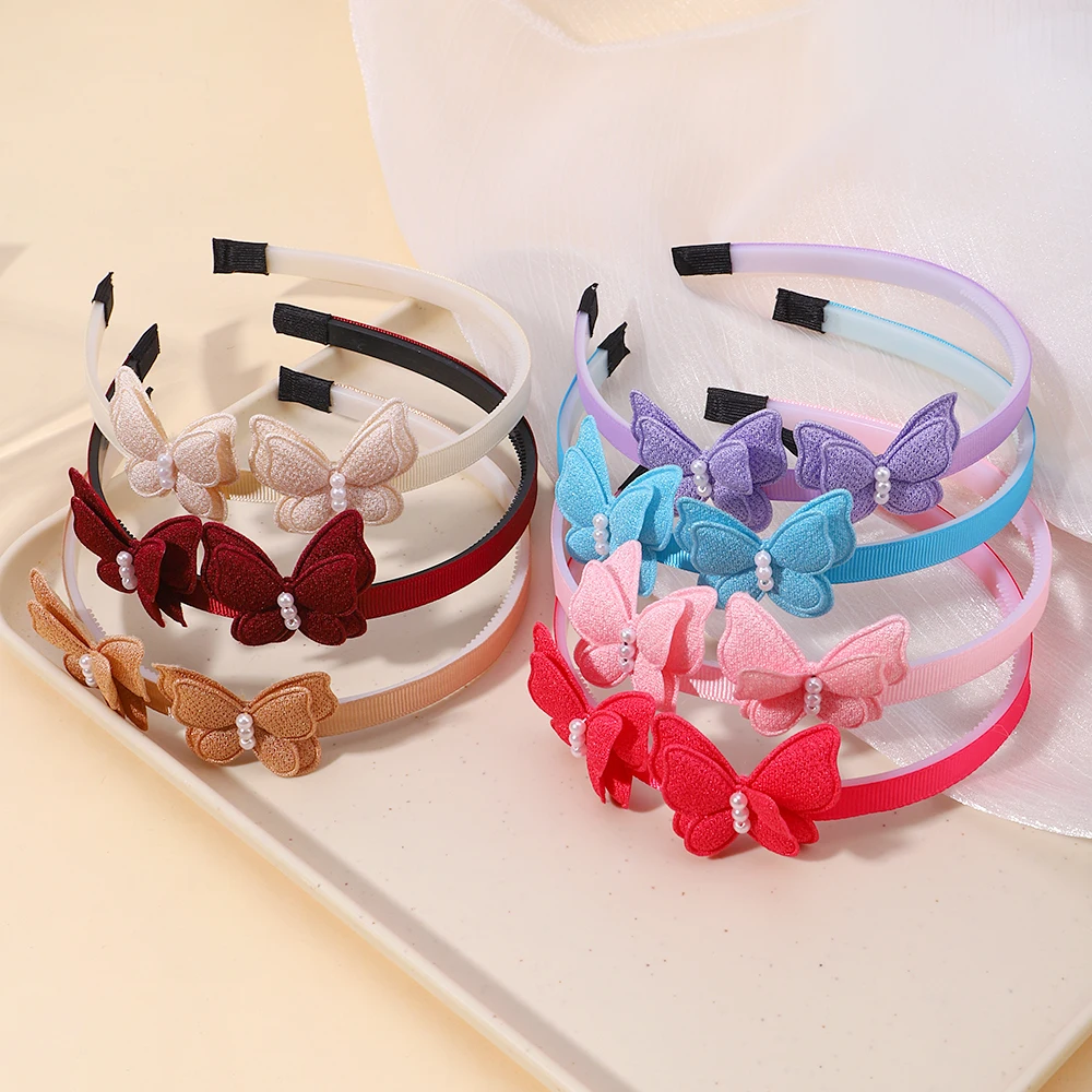 Diadema de pelo con mariposa y perlas para niñas